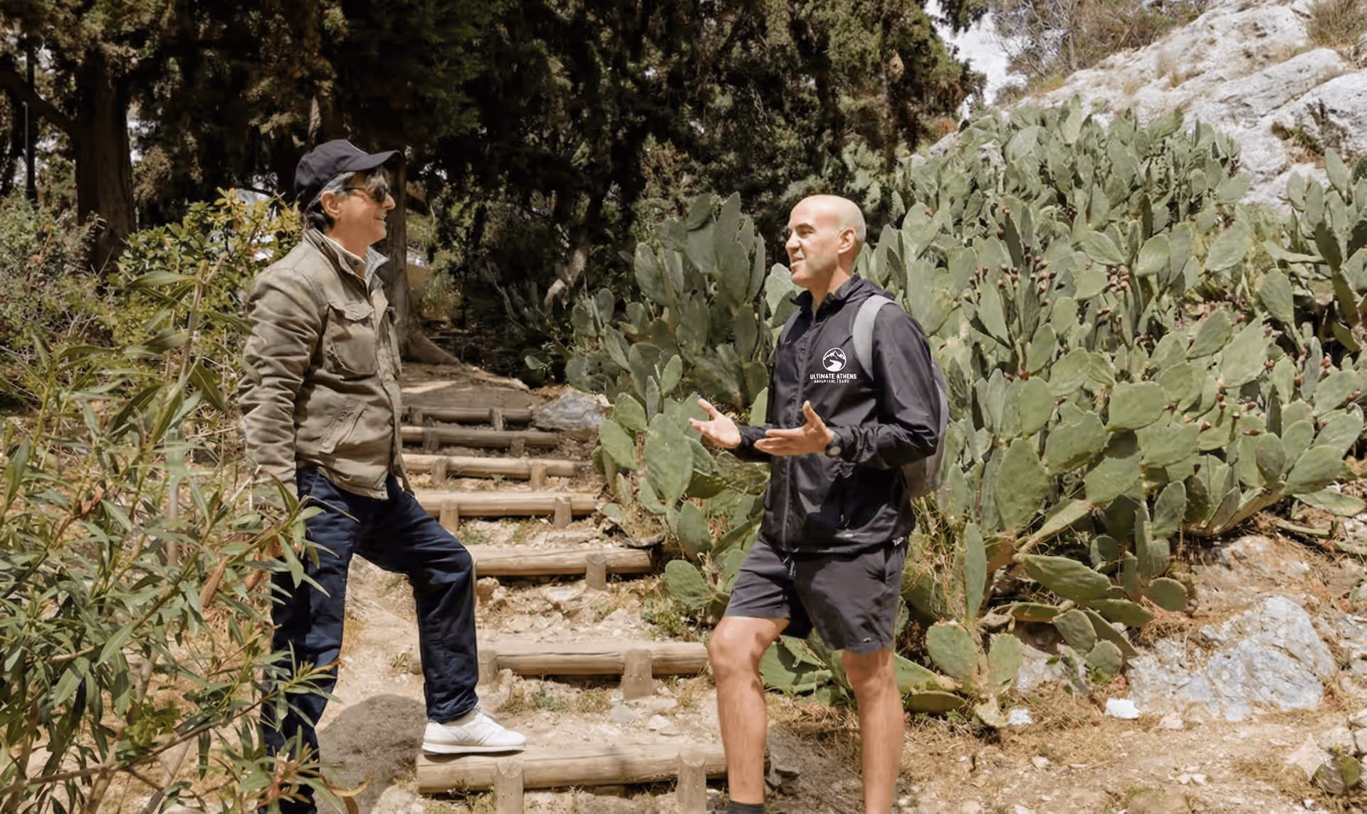 Small group hiking rugged Lycabettus Hill terrain on the Ultimate Athens Hills Climb