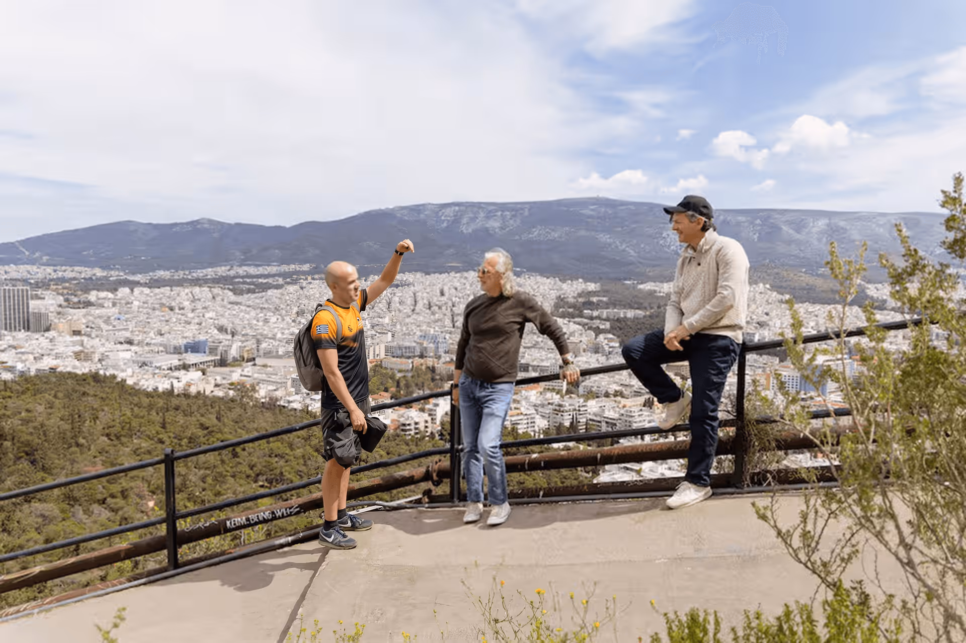 Athens tour leader leading a small group along the scenic Lycabettus Hill hiking trail